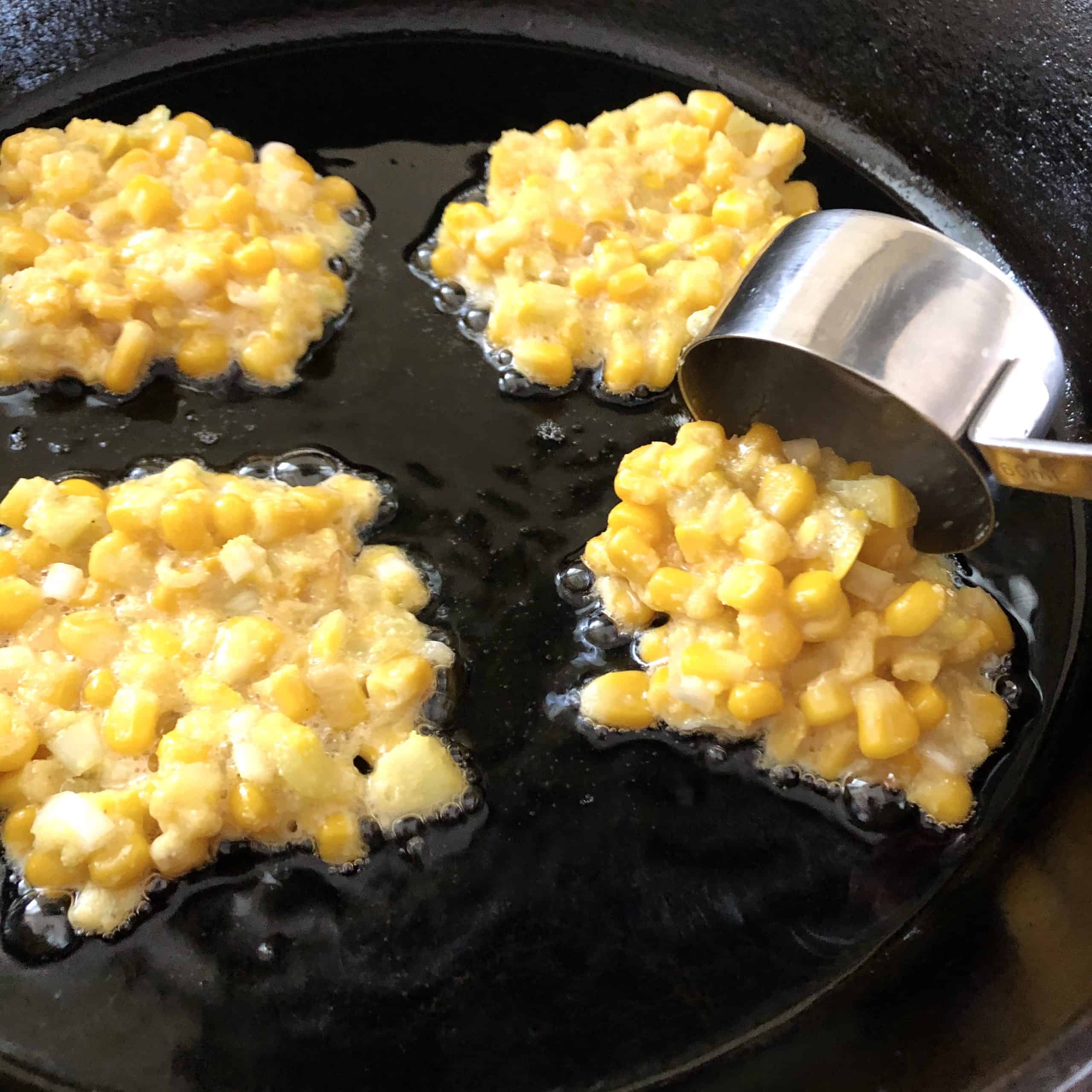 Dropping fritter in the pan