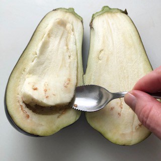 scooping eggplant