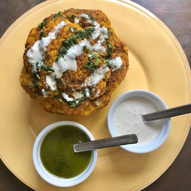 Indian Spiced Cauliflower with Tahini and Herb Sauces