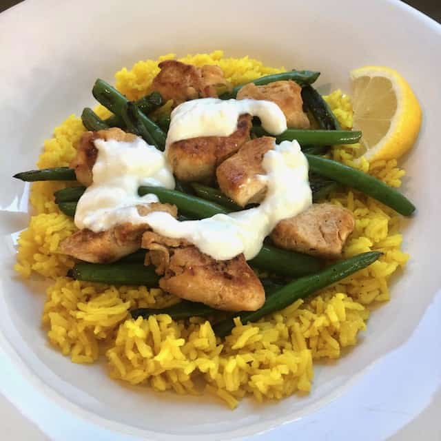 Savory Chicken and Rice with Charred Green Beans.